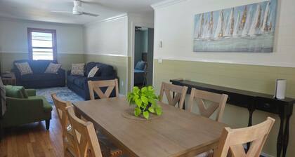 2-bedroom apartment with partial ocean view in Rockport with AC for comfort.