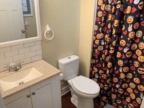 Shower, hair dryer, towels, toilet paper