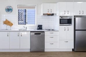 Estudio superior, balcón, vistas al río | Cocina privada