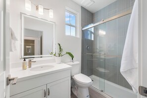Hair dryer, towels, soap, toilet paper