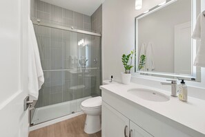 Hair dryer, towels, soap, toilet paper
