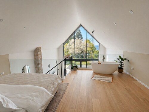 A-frame forest retreat with bathtub and nature view