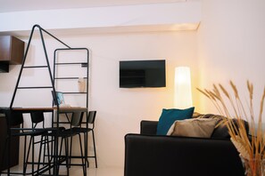 Living area - Library Condo in Baguio City l 1-bedroom, 4 pax l Balai de Selendra l staycation (Baguio City)