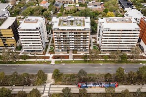 Exterior - Sunlit 2BR Apartment | 7 minutes to Tram | Parking (Dickson)