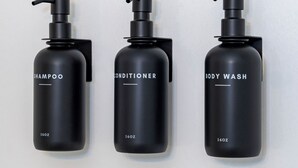Three black bottles of shampoo, conditioner, and body wash with pumps, each labeled and marked 160oz. - Coastal Cottage STEPS to BEACH and downtown Old Orchard Beach - Prime Location (Old Orchard Beach)