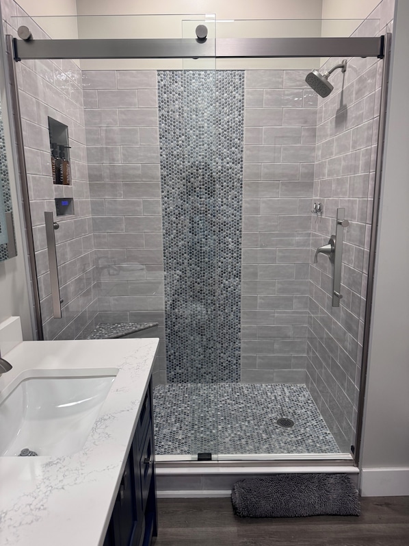 Shower, hair dryer, towels, soap