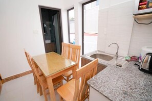 Family Apartment, Balcony, Valley View | Dining - S Villa hotel (Da Lat)