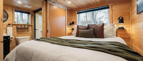 Comfortable queen bedroom designed for a cozy Idaho getaway.