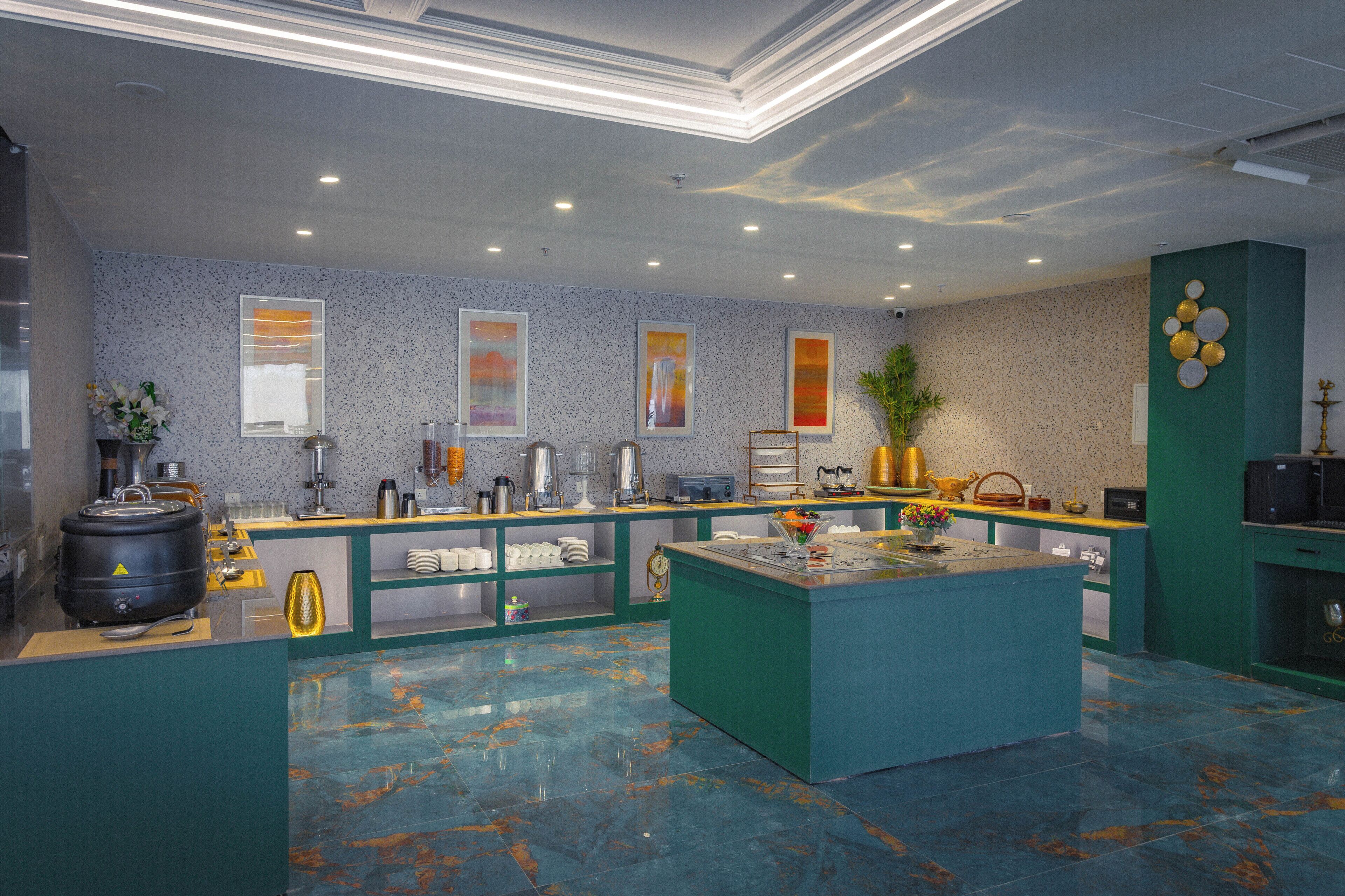 A modern kitchen with a marble floor, a central island, and various appliances.