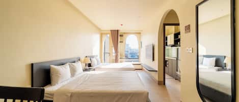 Family Apartment, 1 Bedroom, City View | Premium bedding, minibar, in-room safe, desk