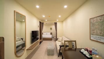 Departamento, 1 cama King size | Área de sala de estar