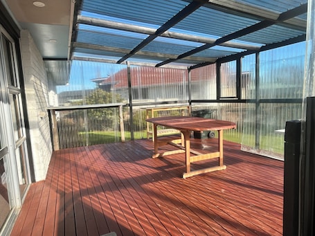 Outdoor dining. Cossey 3 bedroom house