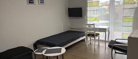 1 chambre, bureau, fer et planche à repasser, Wi-Fi gratuit