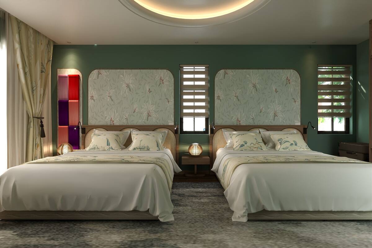 A double bed room with a headboard, a bedside table, and a lamp.