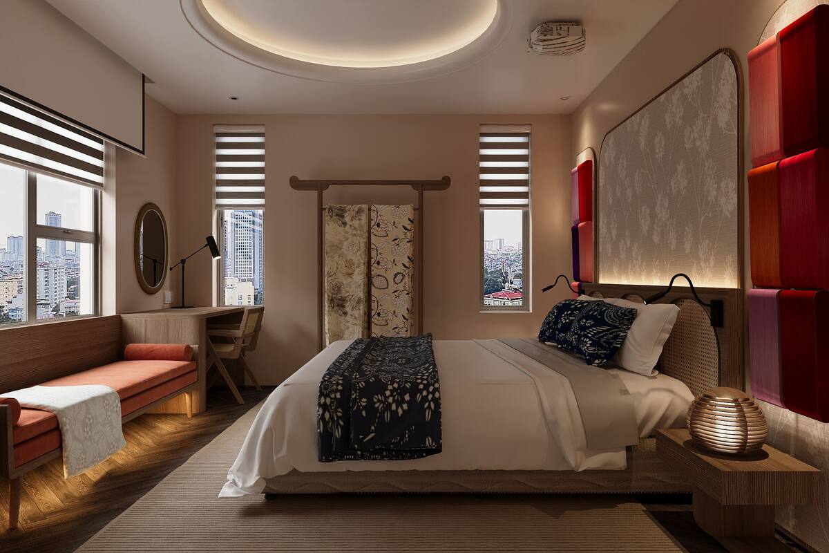 A modern bedroom with a bed, bedside table, lamp, and city view.