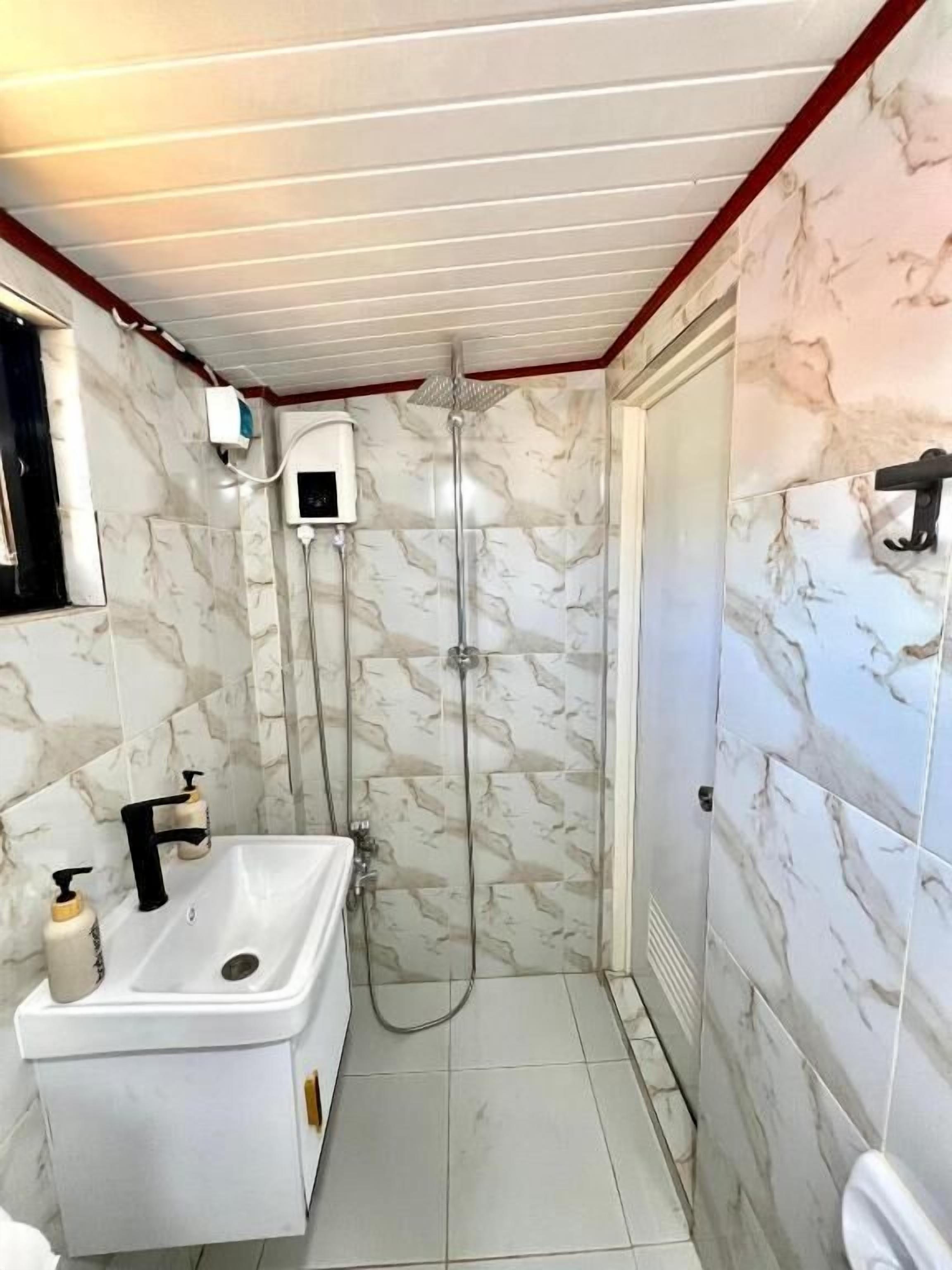 Basic-Doppelzimmer, Gemeinschaftsbad | Badezimmer