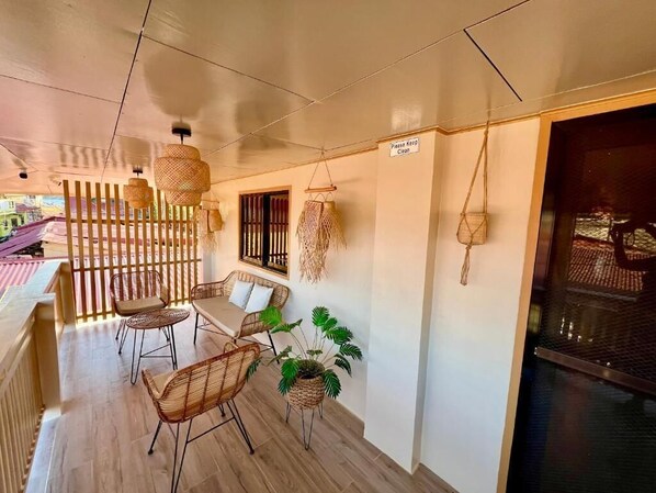 Habitación doble familiar, baño privado | Terraza o patio