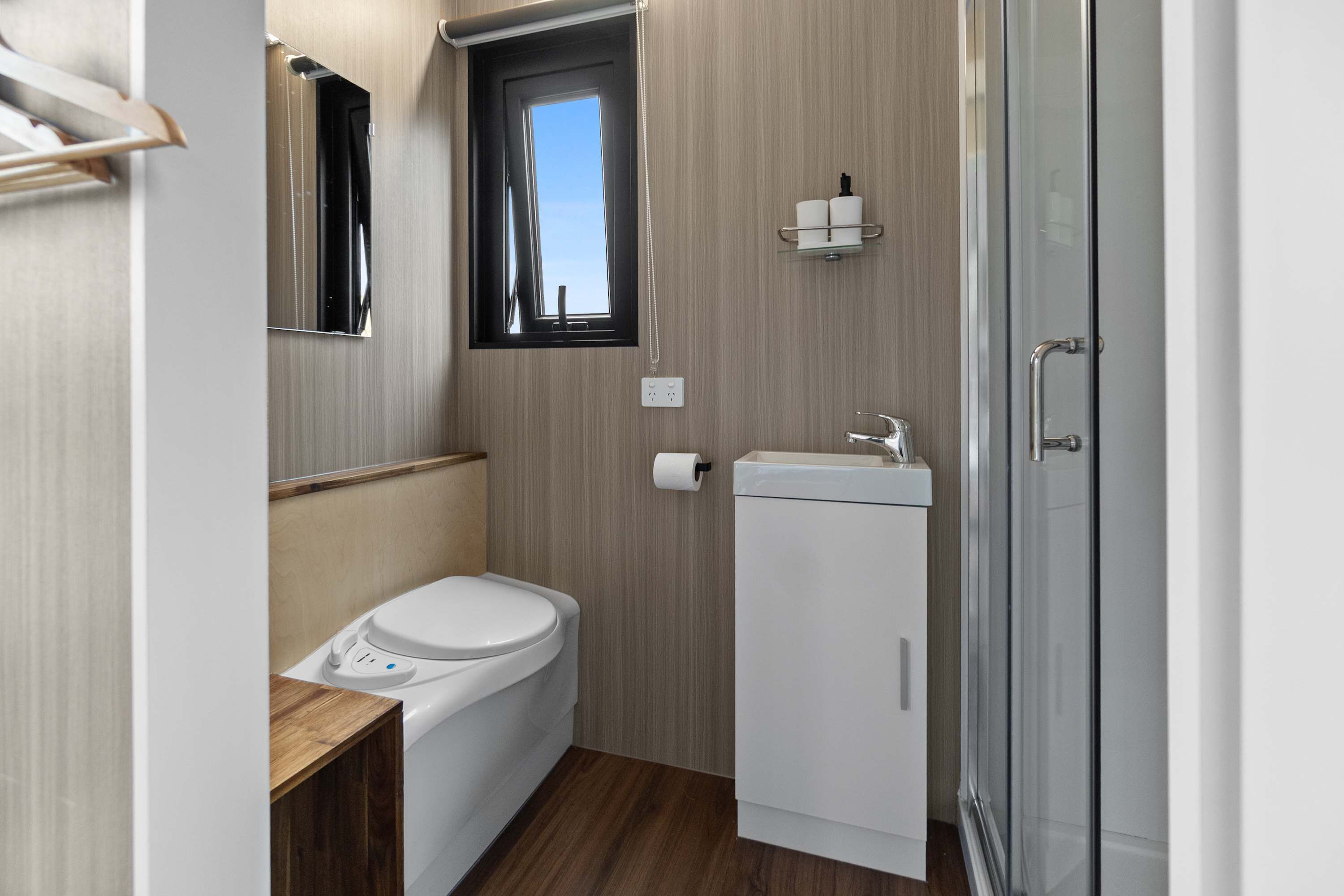 Shower, hair dryer, towels, shampoo