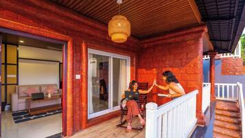 Superior Cottage, Balcony, Pool View | Balcony