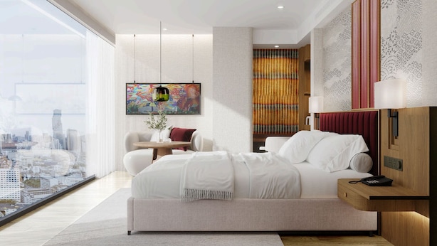 A modern bedroom with a large bed, a city view, a television, and a decorative wall panel. - 39 Wireless Hotel (Bangkok)
