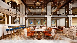 A spacious restaurant with high ceilings, exposed beams, and a central dining area with tables and chairs. - 39 Wireless Hotel (Bangkok)
