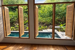 Villa familiar, 2 habitaciones, vista al jardín | Alberca | Alberca al aire libre