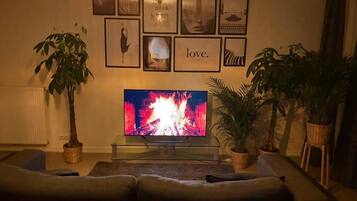 Luxury Double Room, Balcony, City View | Living area | 100-cm LCD TV with digital channels, Netflix, streaming services
