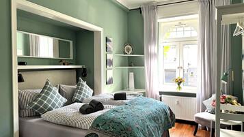 2 bedrooms, desk, iron/ironing board, travel cot