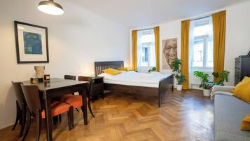 Deluxe Apartment - Kitchenette, Private Bathroom | Living area | Printers