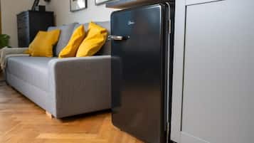 Deluxe Apartment - Kitchenette, Private Bathroom | Wohnbereich