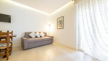 Appartamento Deluxe, vista cortile | Area soggiorno