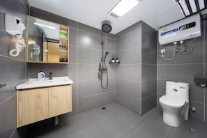 Standard Twin Room, City View | Bathroom | Shower, hair dryer, slippers, towels
