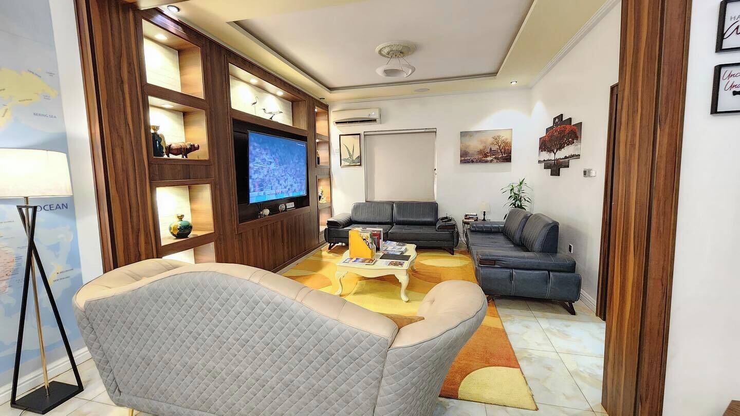 디럭스 아파트, 발코니, 시내 전망 | 거실 공간