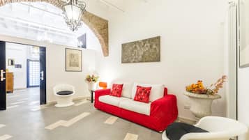 Apartamento conforto, 2 quartos | Área de estar