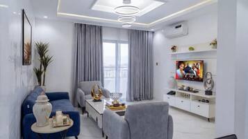 Comfort-Apartment, Balkon, Stadtblick | Wohnbereich