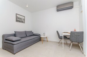 Appartement (A1) | Salle de séjour | Téléviseur connecté