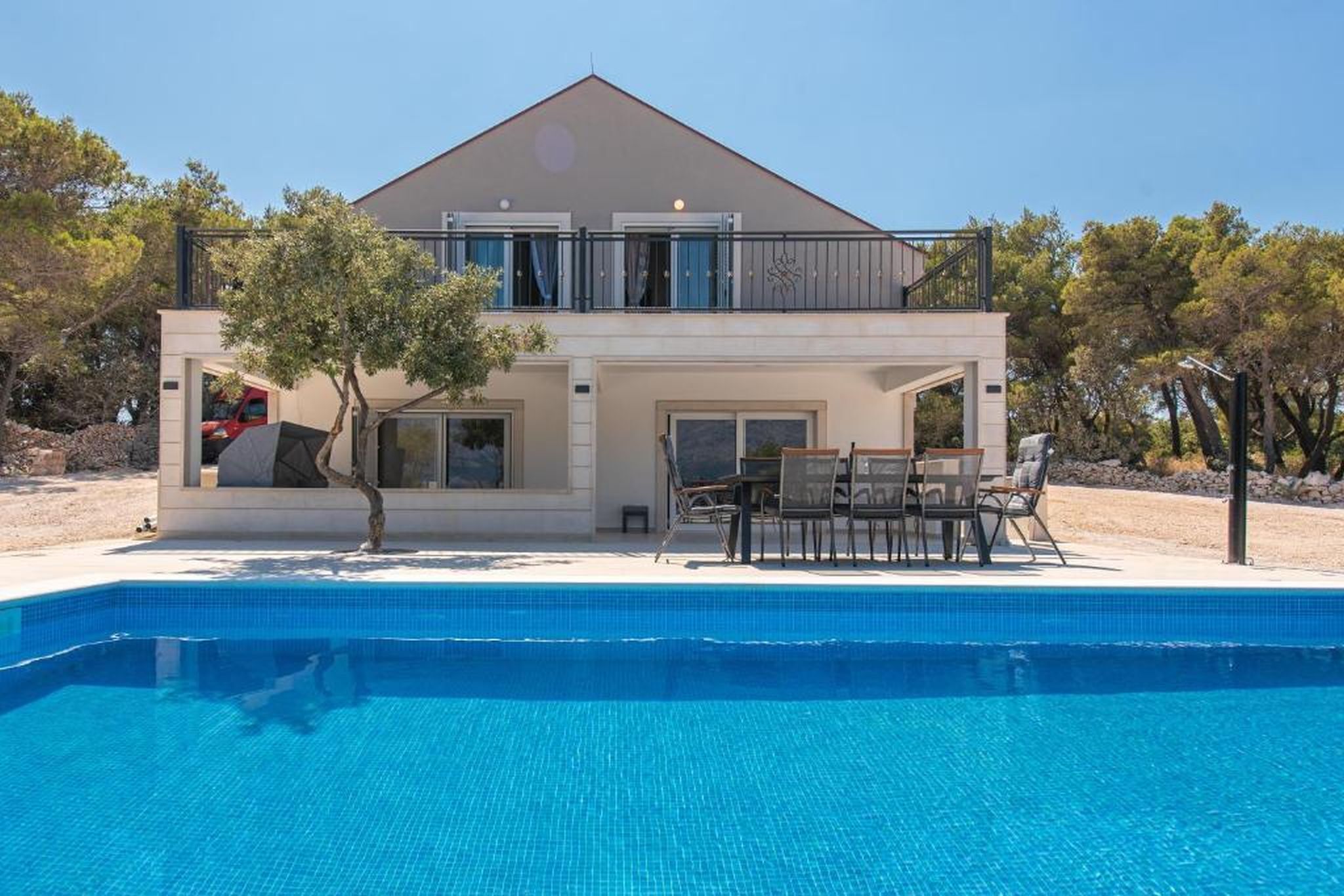 Outdoor pool, pool umbrellas, sun loungers