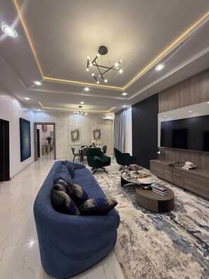 Comfort Apartment, Balcony, City View | Living area - Nouveau Apartment (Abuja)