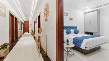 Habitación Deluxe | Minibar (con algunos artículos gratuitos), caja fuerte, escritorio