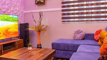 Deluxe Apartment, Balcony, City View | Living area