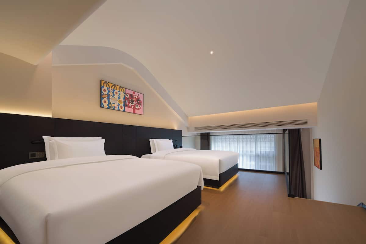 Luxury Triple Room, City View | Desk, laptop workspace, blackout drapes, soundproofing