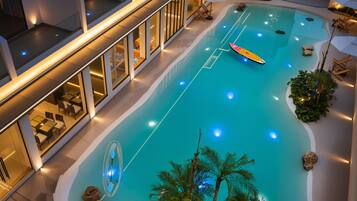 Outdoor pool, open 10:00 AM to 10:00 PM, pool loungers