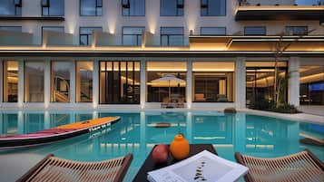 Outdoor pool, open 10:00 AM to 10:00 PM, sun loungers