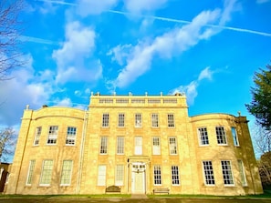 A large, two-story building with a symmetrical facade, large windows, and a central entrance. - Frenchay Park House, Bristol (Bristol)