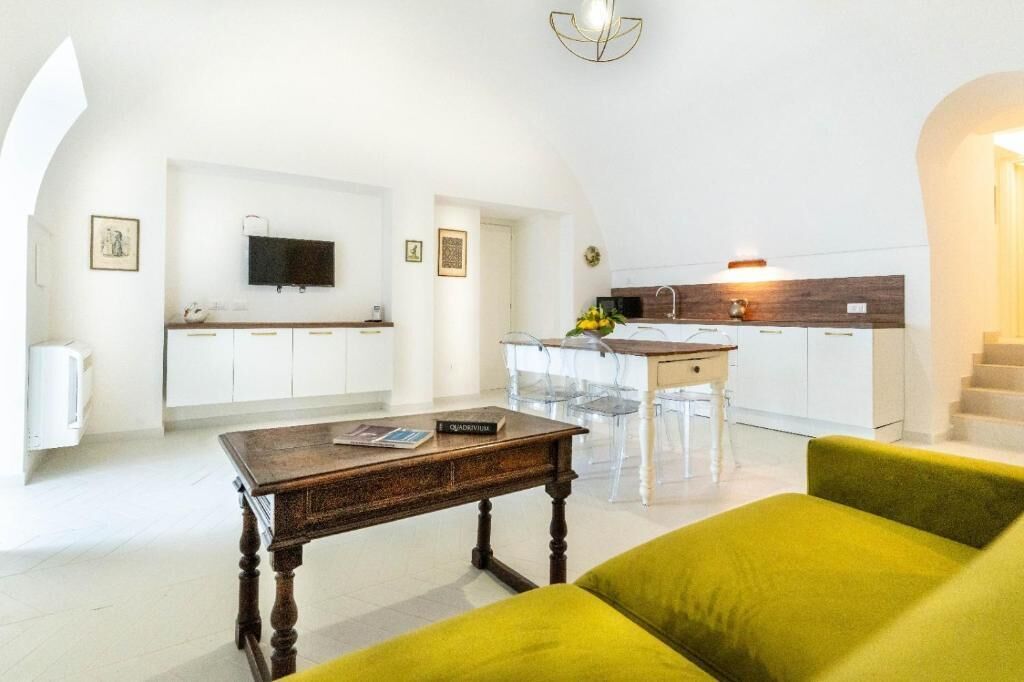 Superior Apartment, Patio, Garden View | Living area | Flat-screen TV