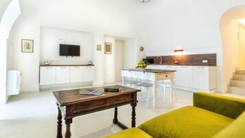 Superior Apartment, Patio, Garden View | Living area | Flat-screen TV