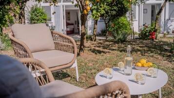 Deluxe-Apartment, Terrasse, Gartenblick | Terrasse/Patio