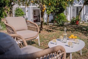 Deluxe-Apartment, Terrasse, Gartenblick | Terrasse/Patio