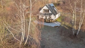 A single-story house with a porch, surrounded by trees. - 4 Star Holiday Home in Humble (Sydlangeland)