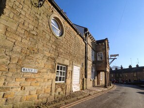 A stone building with a sign reading 'WATER ST.' - Vive House, Ribchester (Preston)
